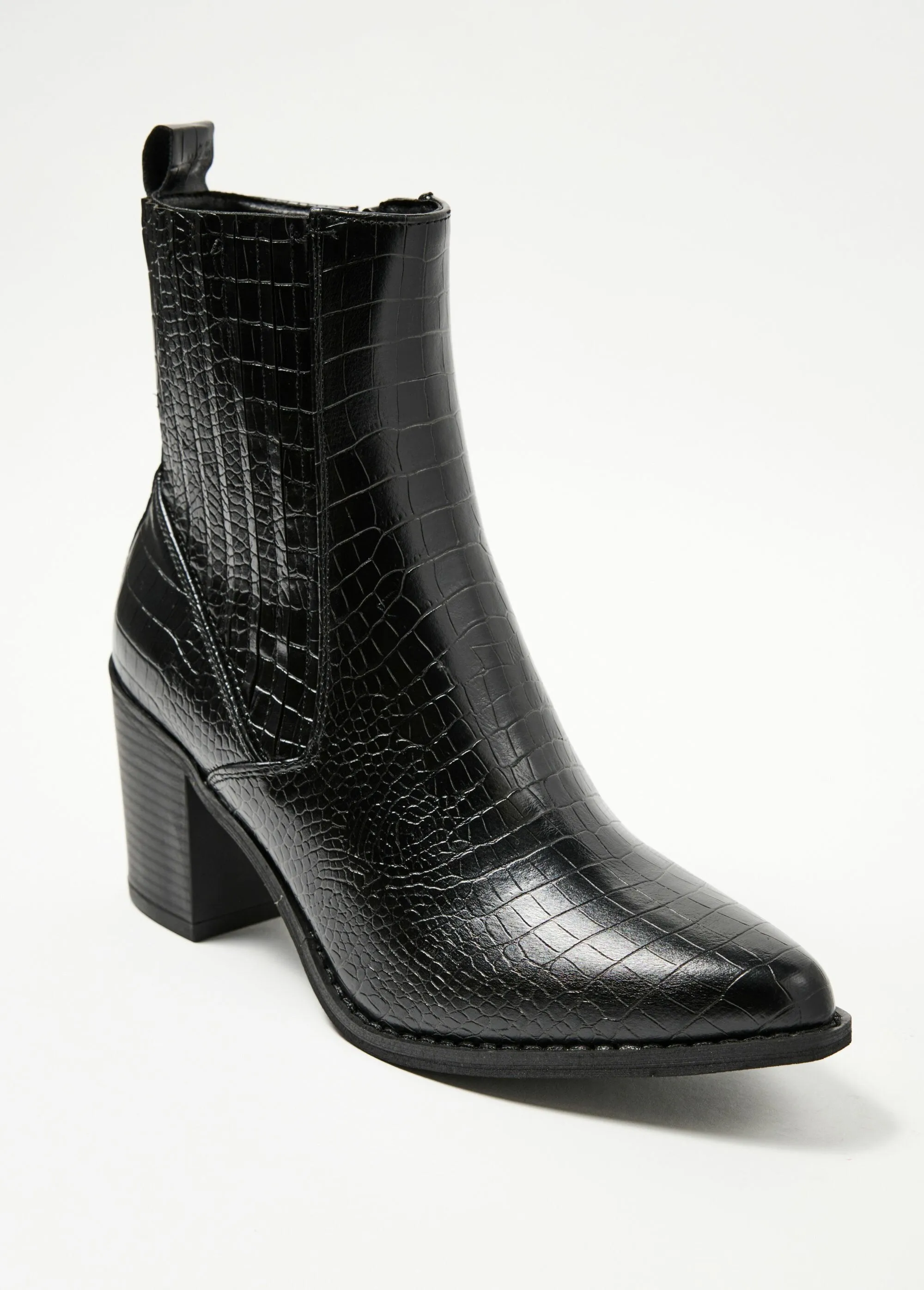 Reptile-style boots with pointed toe heels