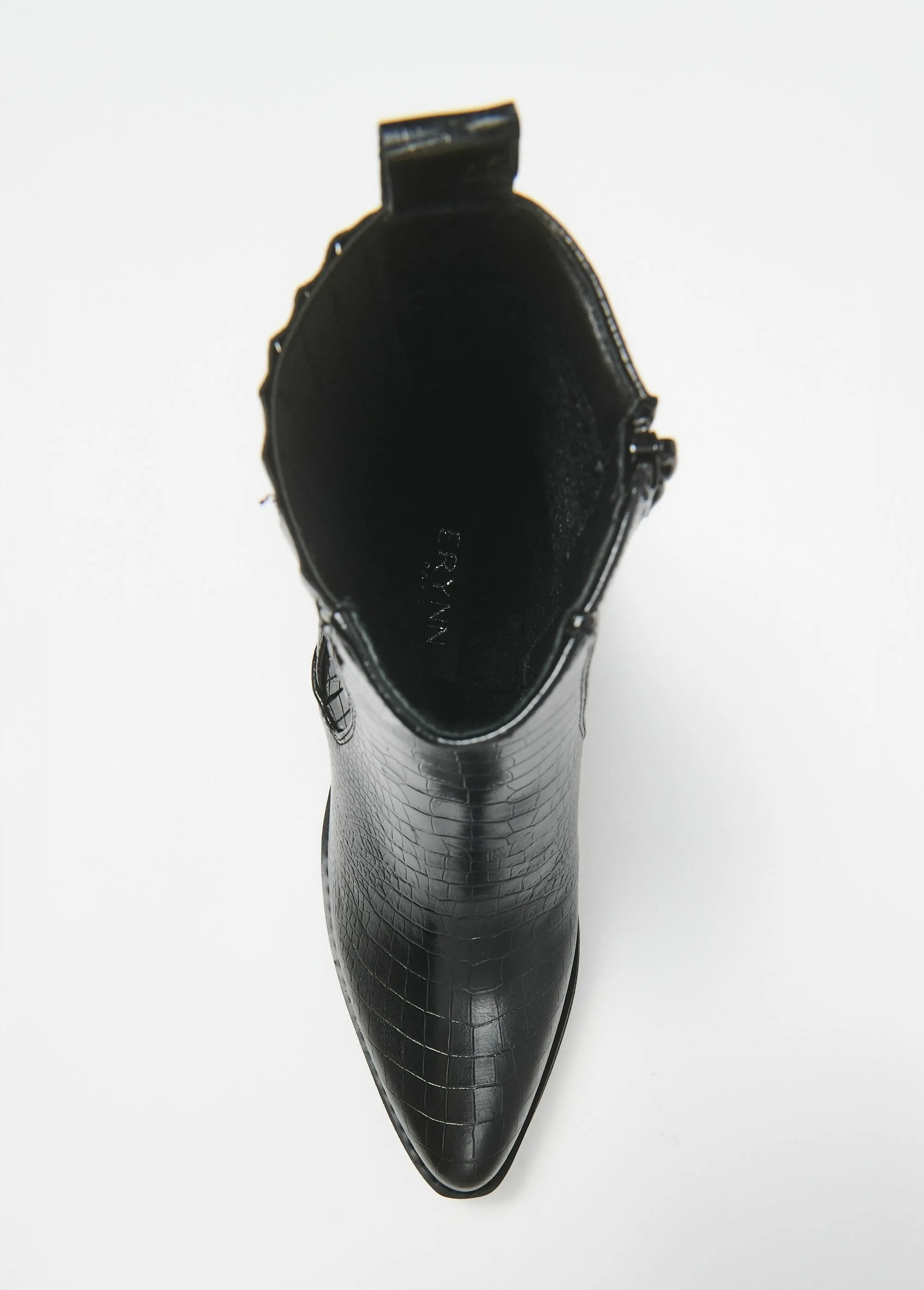 Reptile-style boots with pointed toe heels