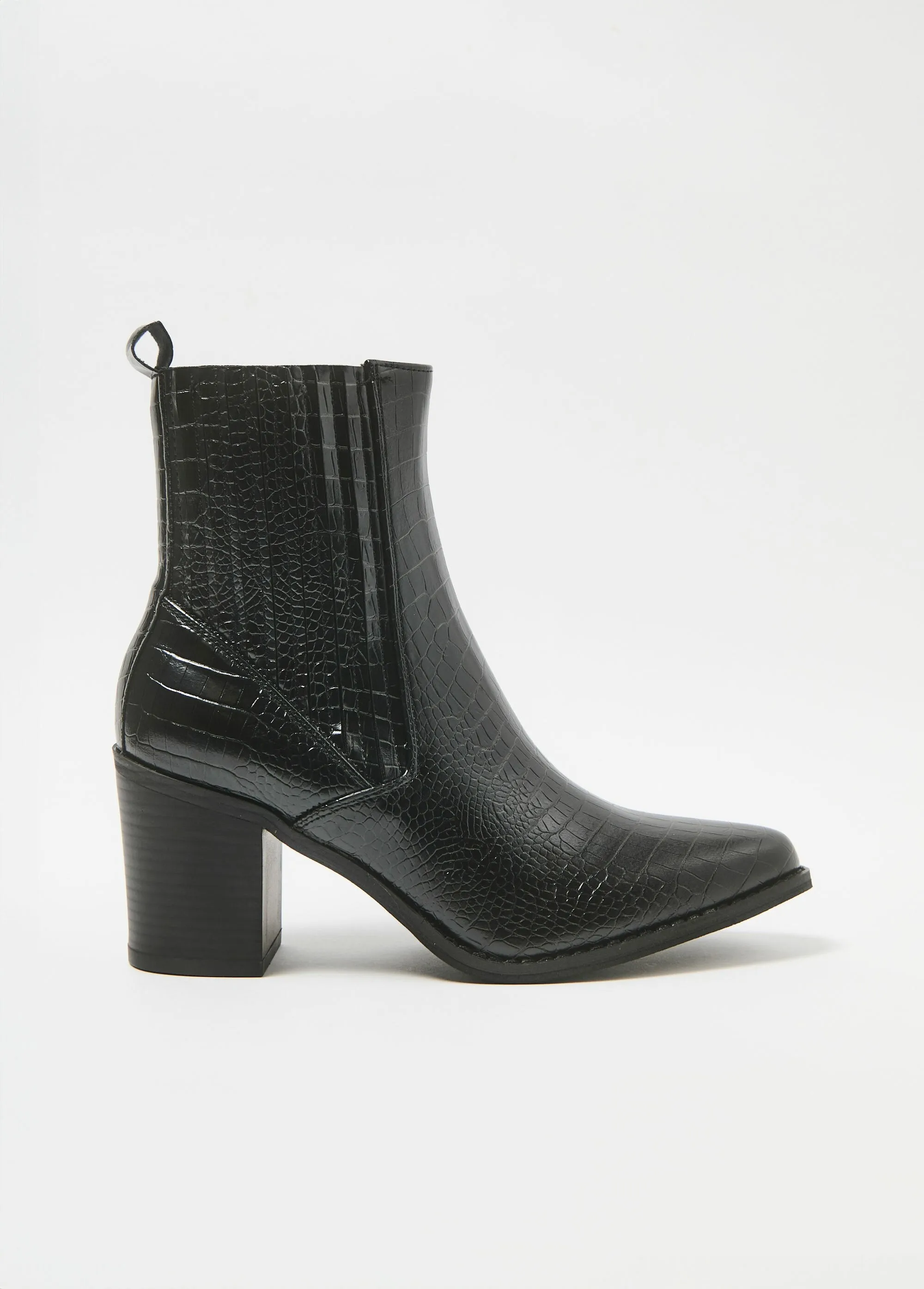 Reptile-style boots with pointed toe heels